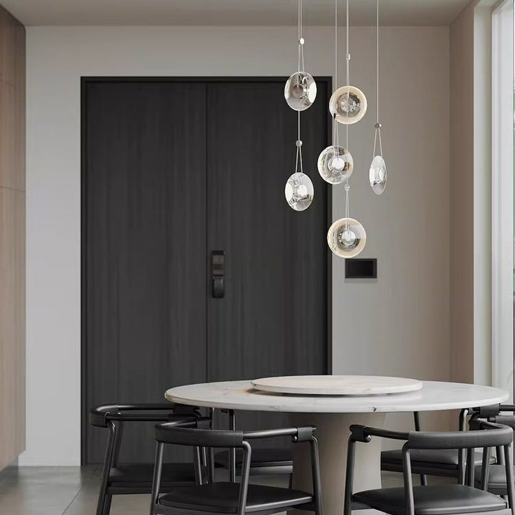 Modern minimalist luxury floating crystal chandelier | Minimalist artistic translucent disc design | Nordic style lighting fixture for living room, dining room, and staircase.