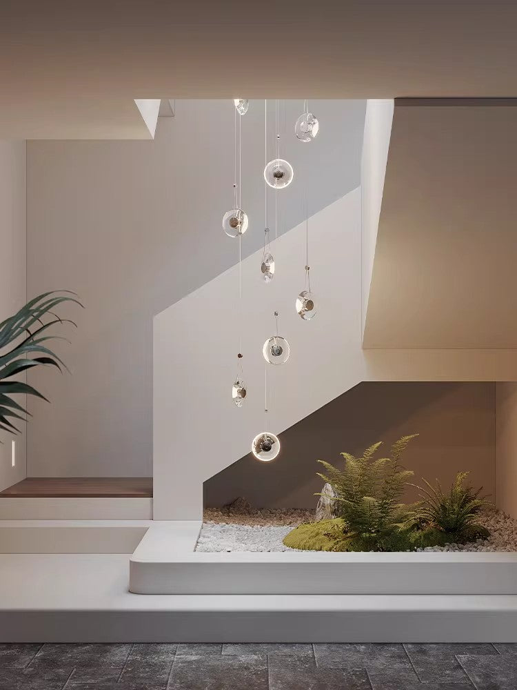 Modern minimalist luxury floating crystal chandelier | Minimalist artistic translucent disc design | Nordic style lighting fixture for living room, dining room, and staircase.