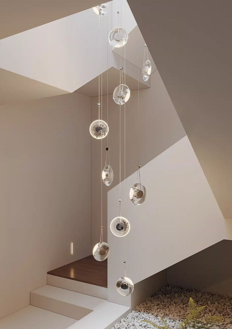 Modern minimalist luxury floating crystal chandelier | Minimalist artistic translucent disc design | Nordic style lighting fixture for living room, dining room, and staircase.